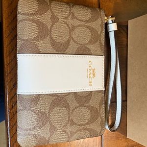 Coach wristlet in original gift wrapping